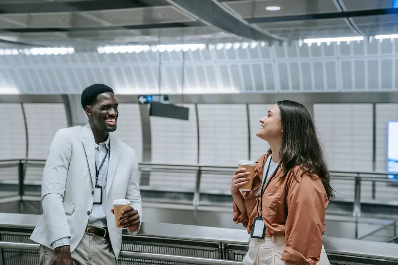 Two professionals talking at a conference